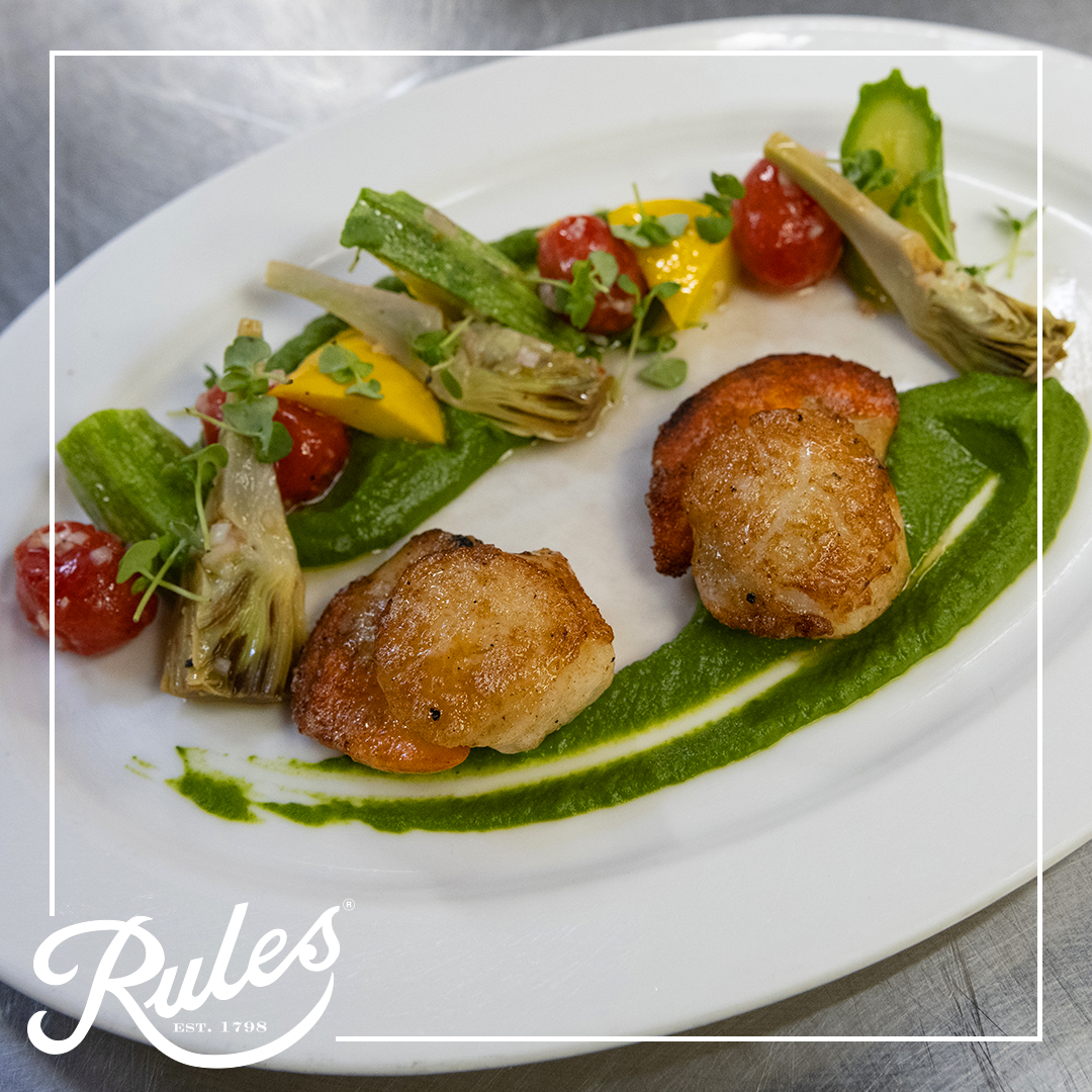 Tasty Tuesday 😋

Scallops with roast tomato, courgette and a basil puree. On the menu NOW at Rules 🍽️