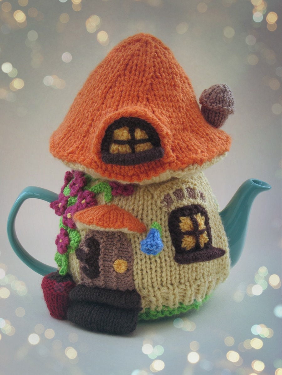 Do you believe in fairies? The cute Fairy House Tea Cosy Knitting Pattern etsy.me/3qrYJHV #knitting #fairy #fairies #woodlandfolk #teacosy #knittingpattern #mushroom #mushroomteacosy #toadstool #TeaCosyFolk #knit