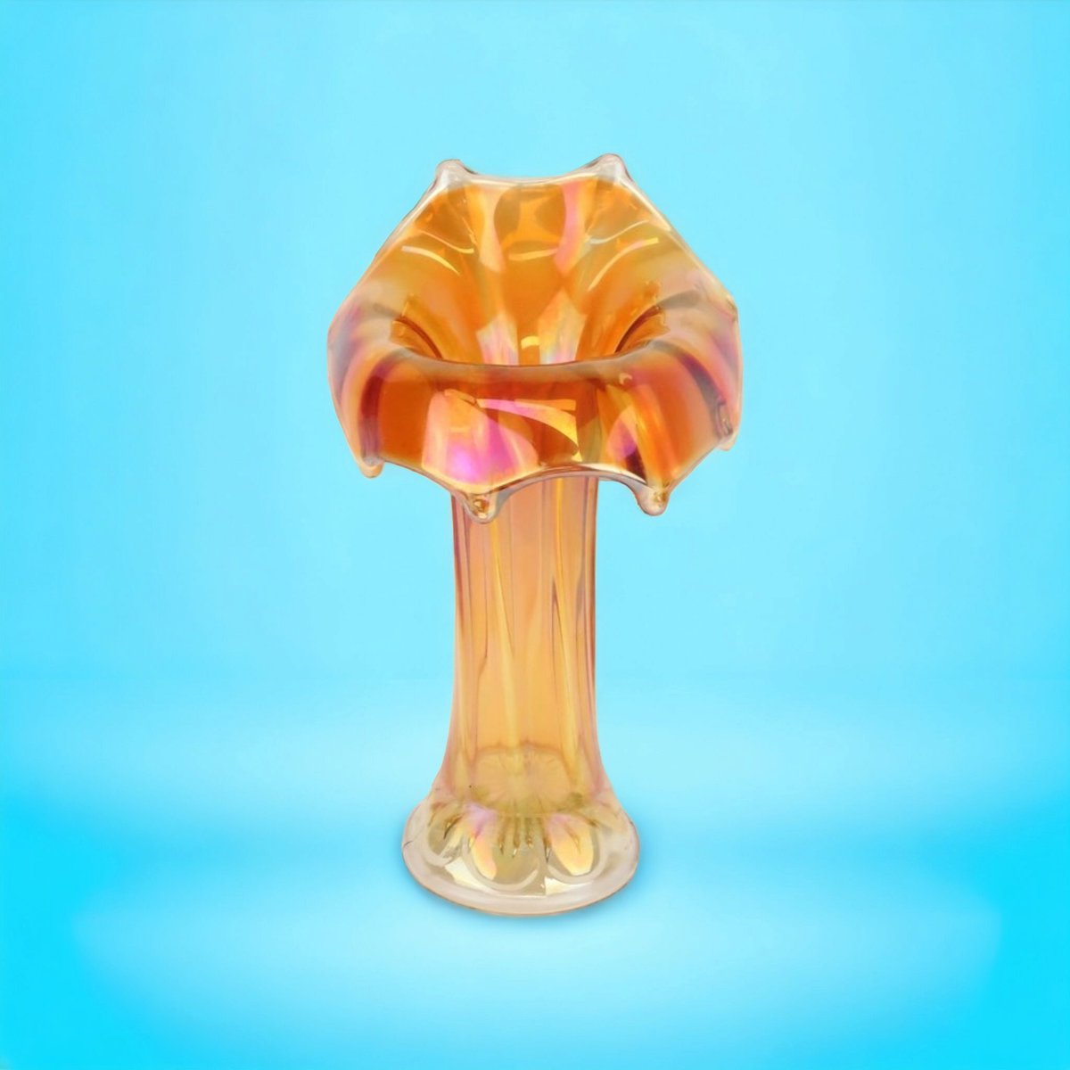 Imperial carnival glass Jack in the Pulpit vase. 'Morning Glory' pattern in iridescent marigold colour. 27 m (h).

Lot # 029 in our Decorative and Designer Glass auction. Accepting bids now.

#glass #carnivalglass #imperialglass #auction #auctionhouse #centralcoast