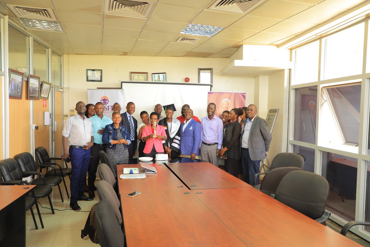 HESFSUG's tweet photo. He Honoured the staff with a cake for the privileged opportunity to attain an education! He asserted that, Loan Scheme students are achievers just like other students and encouraged the government to avail the board with funds so that more Ugandans realize their Education Dream https://t.co/Ni6EU3YBAA