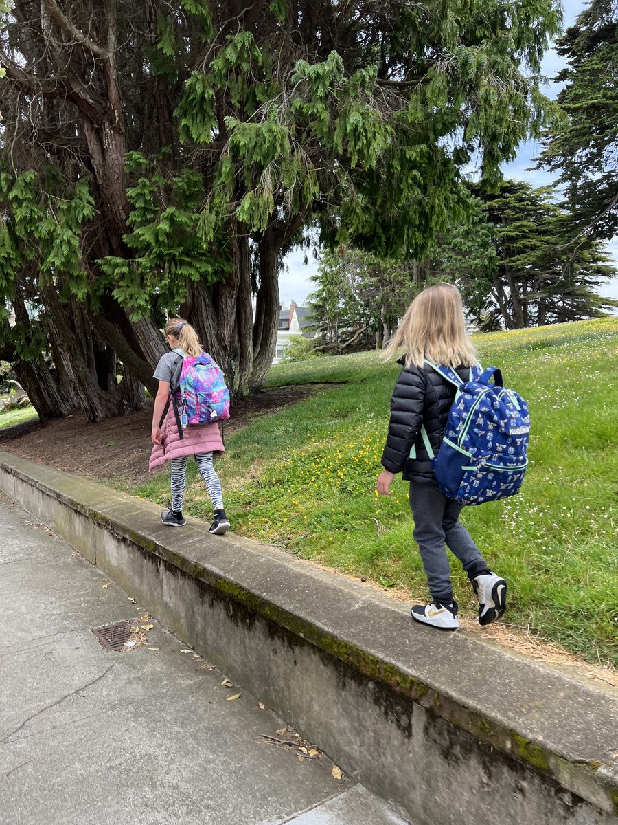 mixing it up … walk to school Wednesday (a day early(!) with unexpected rain shower …