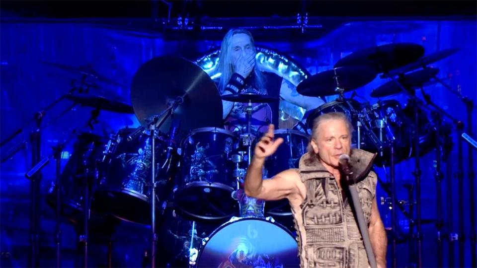 Watch Bruce Dickinson lead a 15,000 crowd singing happy birthday to Nicko McBrain. 