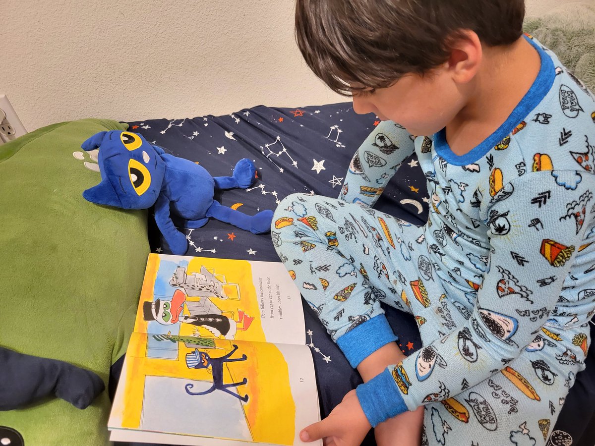 "Found him sitting and reading Pete the Cat his newest Pete the Cat Book thanks to #THISBOOKISCOOL!" <a href="/SuncoastCGLR/">Suncoast GL Reading</a> <a href="/ThePattersonFdn/">The Patterson Foundation</a>