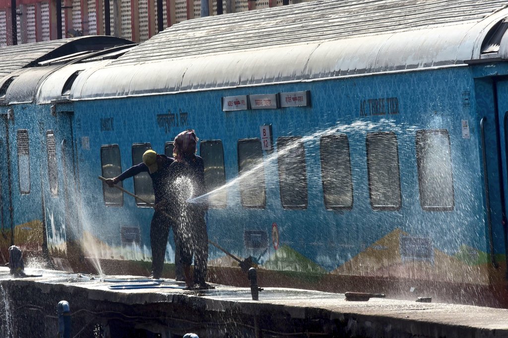 Railway workers wash a train carriage at Prayagraj Junction in Prayagraj
#raiway #workers #hot #summer #water #prayagraj #prayagrajcity