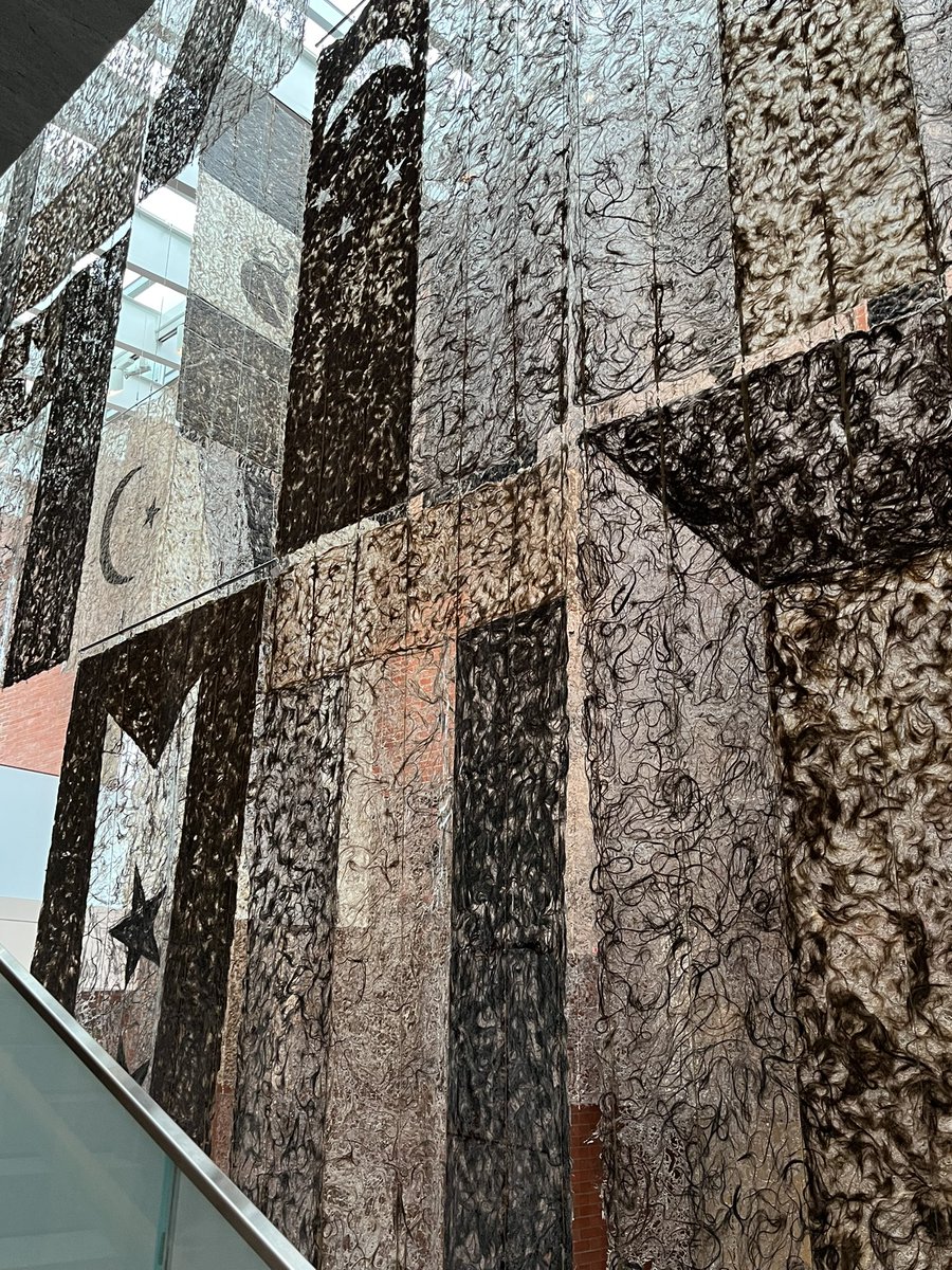 VisualStudiesNU's tweet image. If you’re in Salem this summer, be sure to check out Gu Wenda’s United Nations at PEM, all the flags of the UN countries made entirely of human hair! @peabodyessex