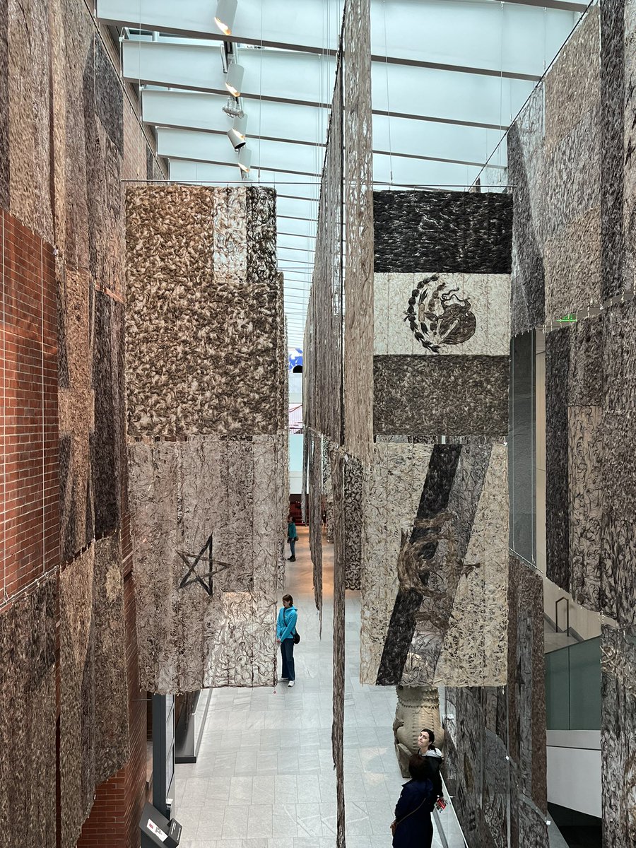 VisualStudiesNU's tweet image. If you’re in Salem this summer, be sure to check out Gu Wenda’s United Nations at PEM, all the flags of the UN countries made entirely of human hair! @peabodyessex
