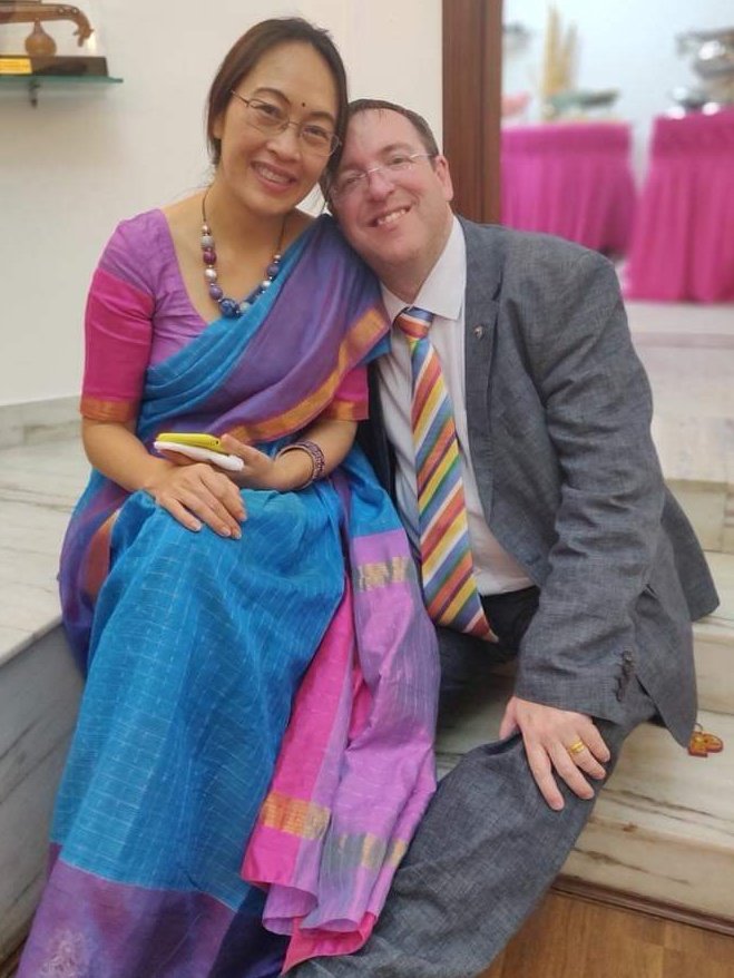 Andrew007Uk's tweet photo. During my 5+ years in 🇮🇳 I became well known for wearing local attire but on some occasions my wife did too - this is my favourite from her saree collection - the picture was taken 5 years ago today. https://t.co/s4wmhe1QSV