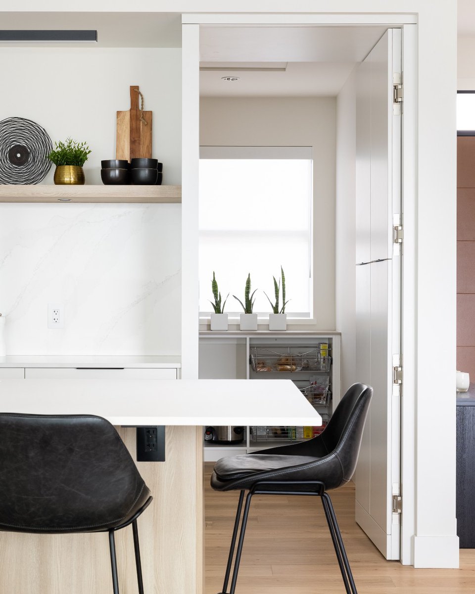 🌿 Discover the hidden magic of this kitchen pantry! 
.
Peek inside the pantry wonderland, cleverly concealed within the heart of this kitchen design. 
#NorelcoCabinets #CustomCabinetry #SpacesForLiving #KitchenDesign #HiddenPantry #KitchenGoals