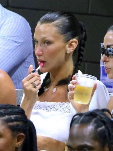 bella hadid applying dior lip oil right after crying, a moment i will never forget