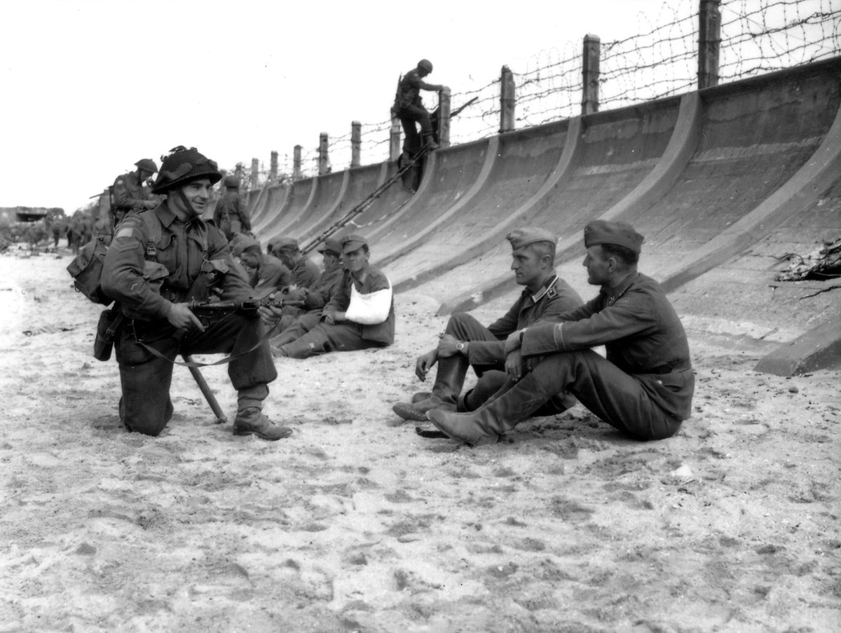 #Canadian troops guarding captured German troops, Berniers Sur Mer, France, on June 6, 1944.

#History #WWII #DDay79