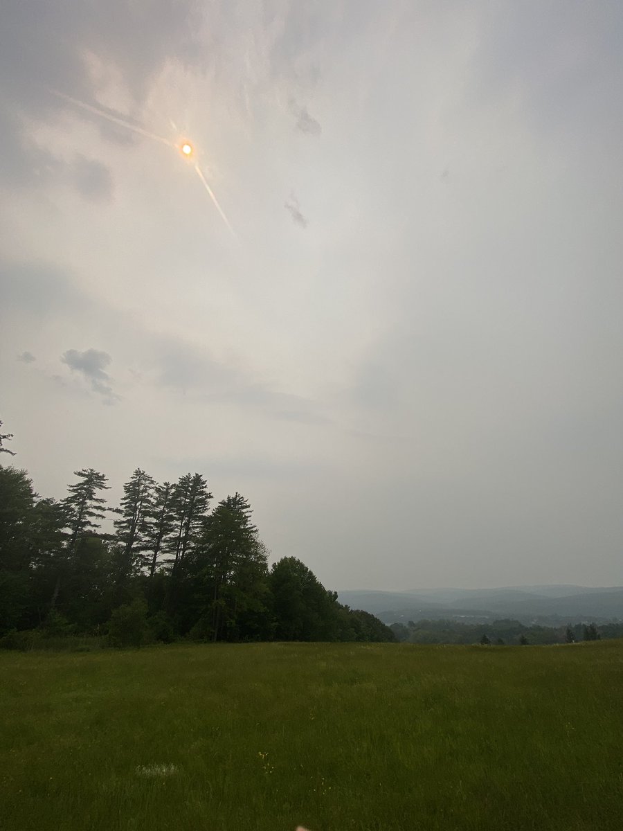 phebert140's tweet photo. Haze and orange tint to the sun this afternoon, I presume due to Canadian wildfire smoke. Taken in Walpole, NH, facing west towards Vermont hills. 

@HayleyWMUR @NWSGray @mikehaddadWMUR @KevSkarupaWMUR @JacquelineWMUR @MattHoenigWMUR https://t.co/L8TIFnbpnw
