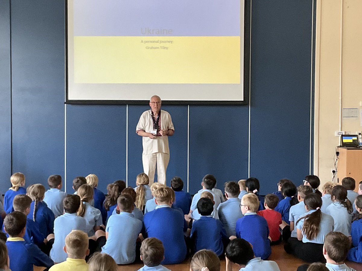 SWRBPS's tweet image. International Week saw Graham Tiley, Schoolsworks Board of Trustees, talk to Y5/6 about his personal experience of living in the Ukraine. Dressed in a traditional Vyshyvanka outfit he took them on a journey of life in the Ukraine through his photographs.  
@schoolsworks