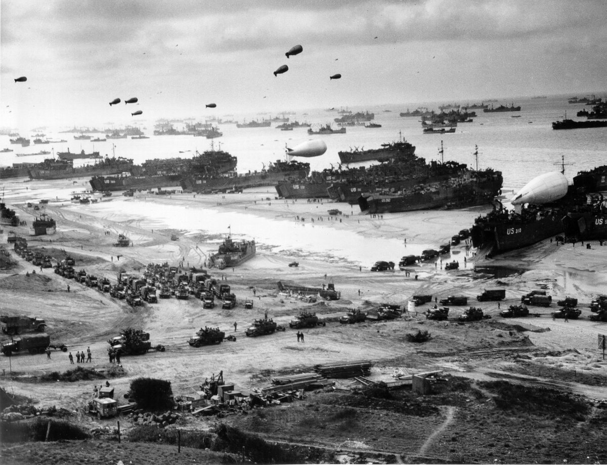 LSTs landing vehicles and cargo on a #Normandy beach in June, 1944.

#History #WWII #DDay79