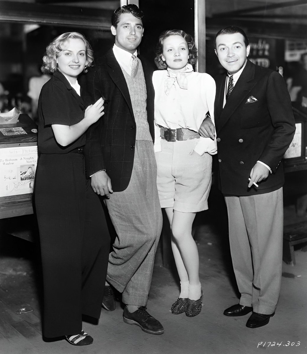 It's #Friday! Party's on! 🎉🔥 #weekendvibes

 #CaryGrant with #CaroleLombard, #MarleneDietrich, and #RichardBartholomew at Lombard's party in the Fun House, California, 1935. 🎪🎢