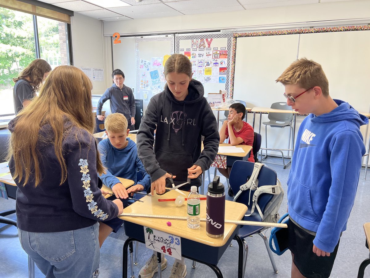 HighlandCT's tweet photo. CHS Science National Honor Society students teach a STEM lesson to Highland 6th graders. https://t.co/e2jvpvkCCa