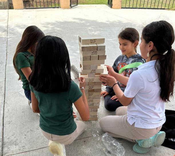 LasPalmasEISD's tweet image. Our leaders enjoying their new outdoor games during recess.  We work hard and love to play hard!  #LPLS4Girls #LPEPawsUp