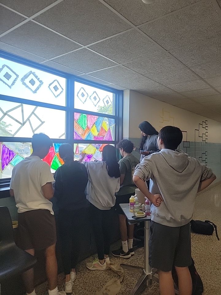 ScigsScience's tweet photo. Hallway beautification project... adding a little color with the honor society. @principalBUFSD https://t.co/K1MNAadMzU