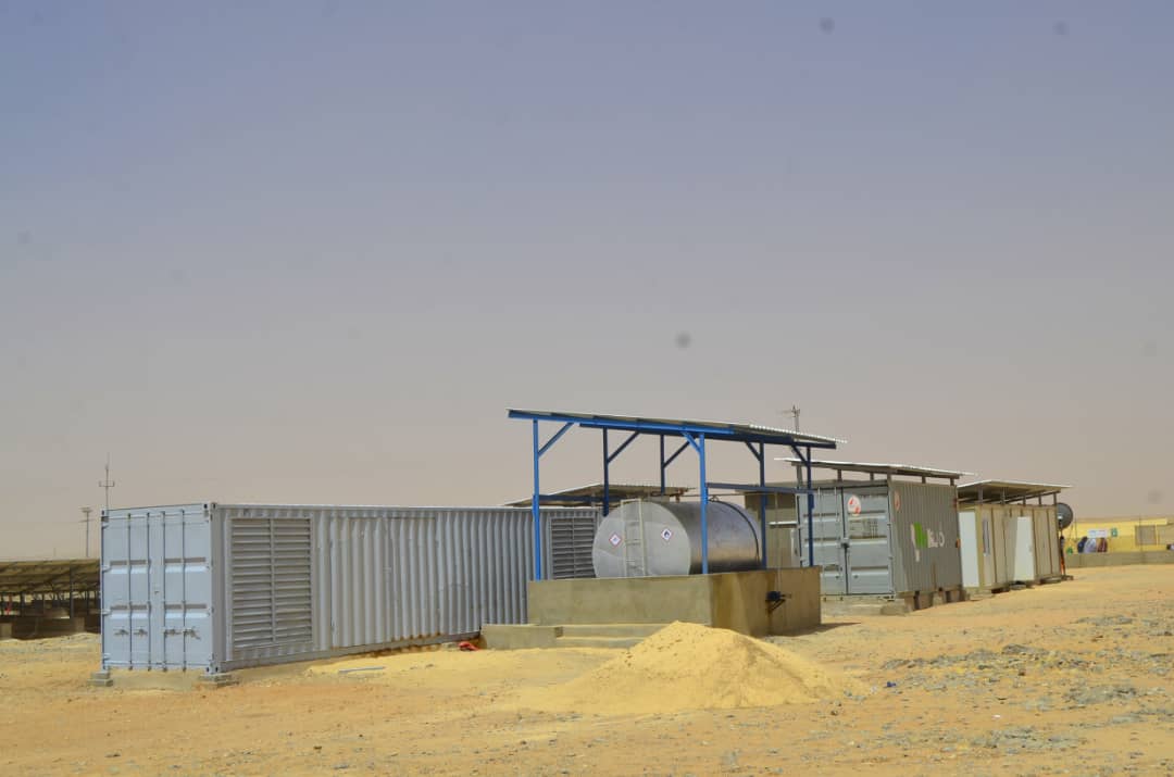 Ibrahimayacoub's tweet photo. J'ai présidé ce jour,l'inauguration de la Centrale hybride solaire-diesel d'#Ingall,#Agadez.Cette Centrale va désormais couvrir à plus de 100% les besoins de la ville, 24h/24.
La construction de 29 km de lignes a permis de couvrir l'ensemble des quartiers de la ville d'Ingall. https://t.co/8xGHAcFQnN