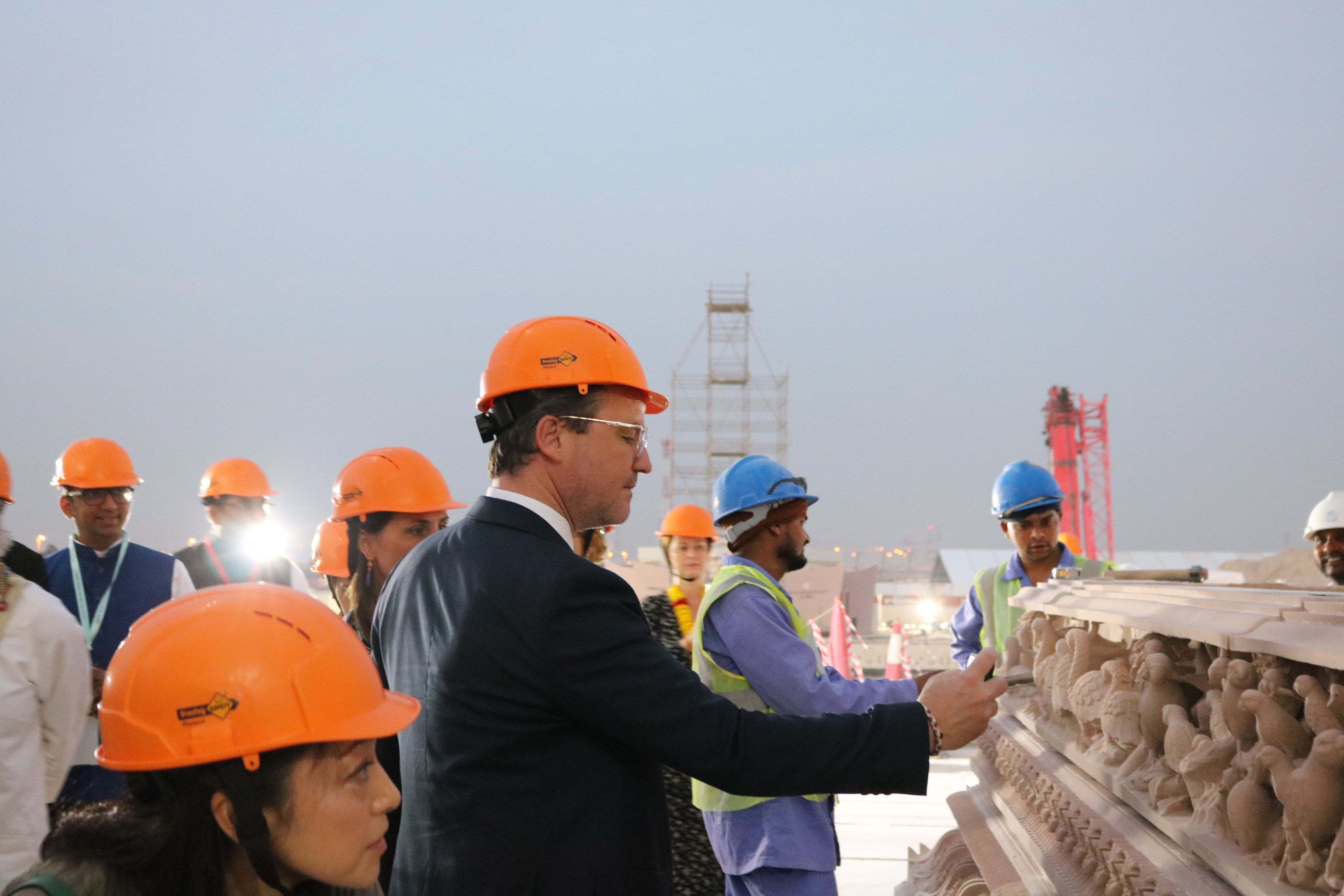 Diplomats from more than 30 countries embark on visit to remarkable BAPS Hindu Temple complex in Abu Dhabi . The temple's foundation stone laid by PM @narendramodi in 2018.  Indian Ambassador to UAE, Sunjay Sudhir says the visit aimed to showcase the temple's exquisite carvings and motifs representing diverse cultures from around the world, emphasizing the values of unity and cultural appreciation.He highlights longstanding friendship between India and the UAE, rooted in history, culture, and trade. He commended the tolerance and generosity of  UAE leadership and expressed his belief that the temple represents the collective aspirations of the Indian community in the UAE, particularly the saints and volunteers of BAPS, who tirelessly and selflessly serve to build this temple of tolerance and harmony. Swami Brahmaviharidas warmly welcome ambassadors, stating that the presence of the diplomatic community and their families exemplified the unifying power of faith and culture.External
