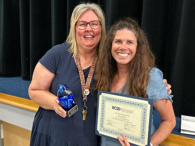 Celebrating @RaineyTeacher3 and @Vandiviergrade3 for 10 and 20 years of service! #rcsdchampions