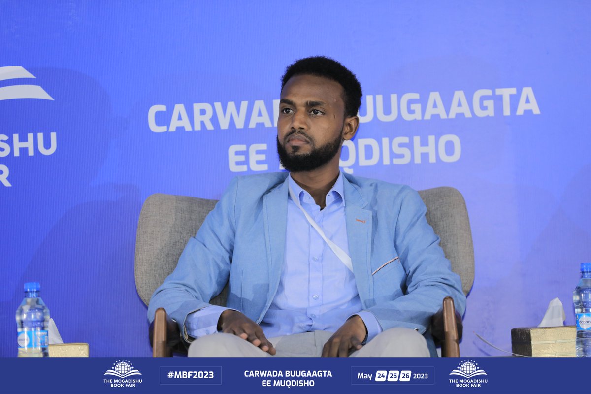 MogBF's tweet photo. What better way to start day 3 of #MBF2023 than with a captivating panel discussion? Moderator Yaasir Osman speaks with authors Abdikadir Abdulbari, Nimco H. Osman, and Bahja Jama as they chat about their latest projects. A must-see for all book lovers. https://t.co/cu0a3qyak7
