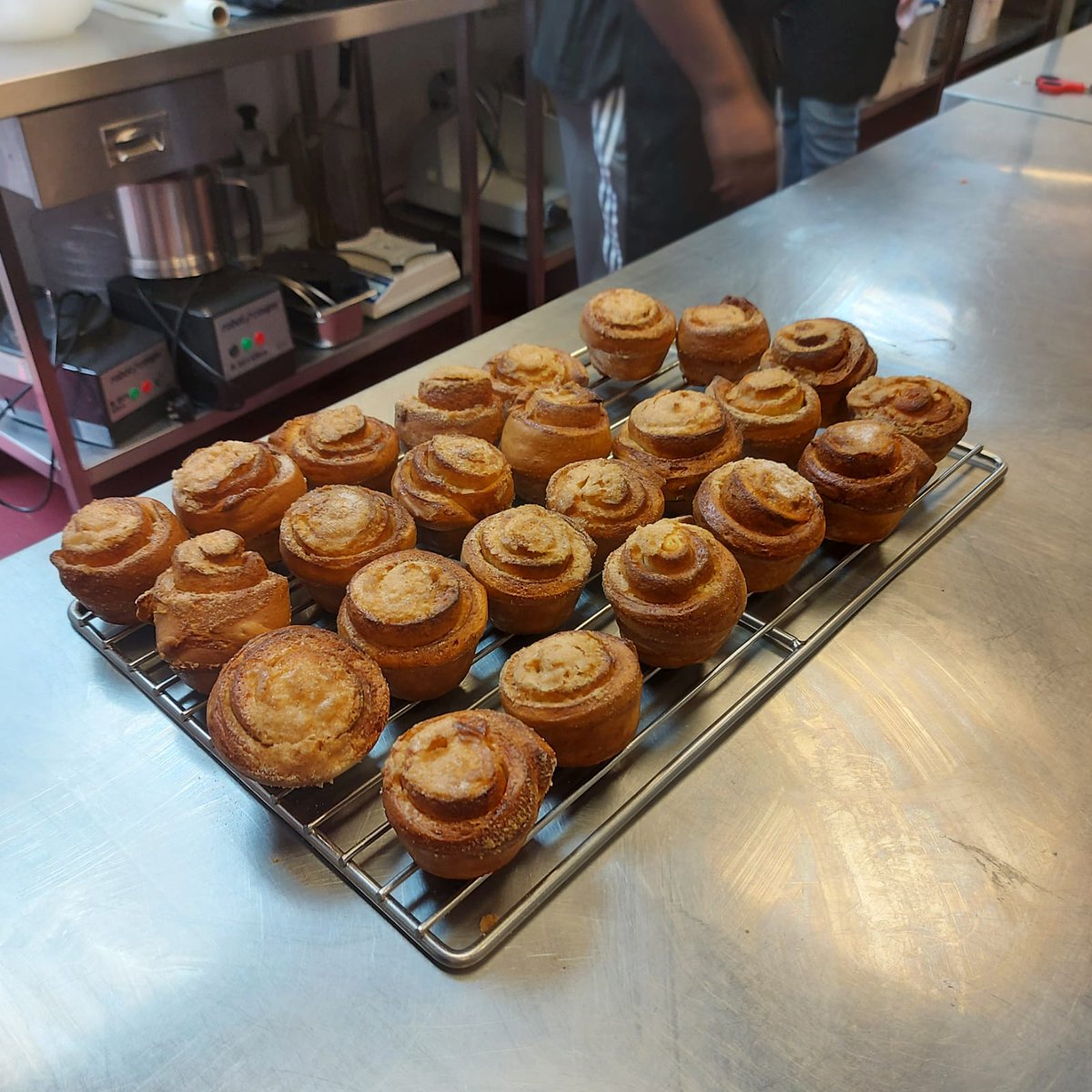CareTradeUK's tweet photo. Happy Friday! It's all going on at our #workingkitchen in #Greenwich Shame you can't smell how amazing these #cinnamonbuns are. #internships #Catering #getautismworking https://t.co/ffZRtt2c7B #Autism #neurodiversity #skillsforwork @MIGreenwich https://t.co/pzAJcgqvTg