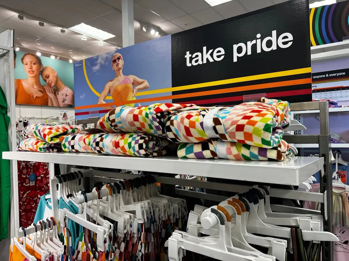 Shopping at Target, you pass the pride display and put some pride merch in your cart. 

Later, you realize you don't need any pride merch. You accidentally place it behind the adult diapers. 

Since you don't actually need anything at Target you then exit the store.