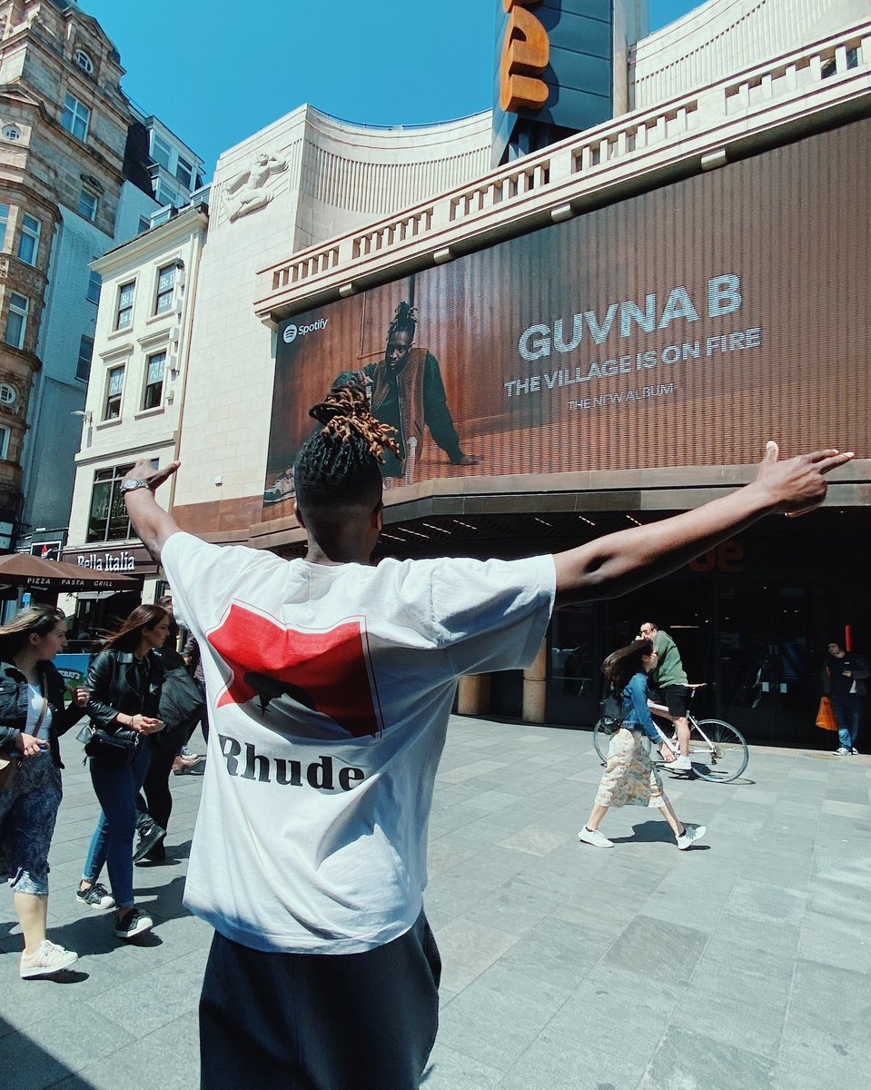 Proud to give you my new album, The Village Is On Fire. It’s an album full of battles and blessings and I hope you get something from it. But and stream it like there’s no tomorrow. Love 🏚️ 

Thanks to @spotify @spotifyuk for putting my big head up in Leicester Square 🖤