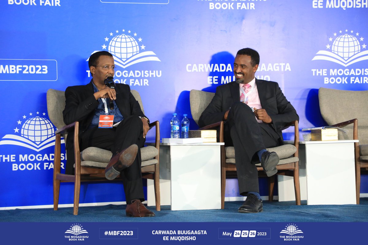 MogBF's tweet photo. Moderator Maxamed Xaraare sat down with author Ahmed Issack Hassan at the #MBF2023 for an exclusive behind-the-scenes look at his book, “Referee of a Dirty Ugly Game,” and his extraordinary life. #MBF2023 https://t.co/7RLbgSb0ap