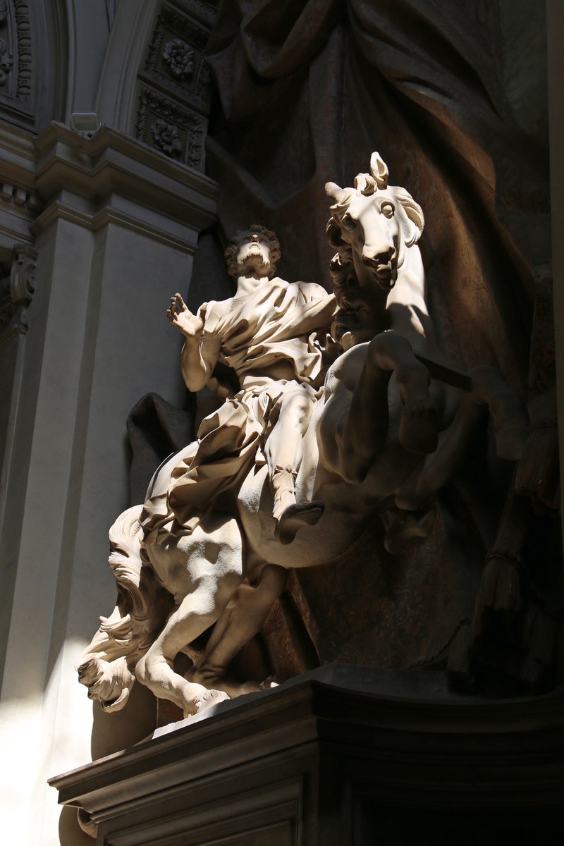 'The Vision of Constantine' marble equestrian statue completed by Bernini in 1670. In its niche at the foot of the Vatican’s Scala Regia, the sculpture is carefully positioned to receive light from a high window, replicating the miraculous solar vision of Constantine in 312 AD.