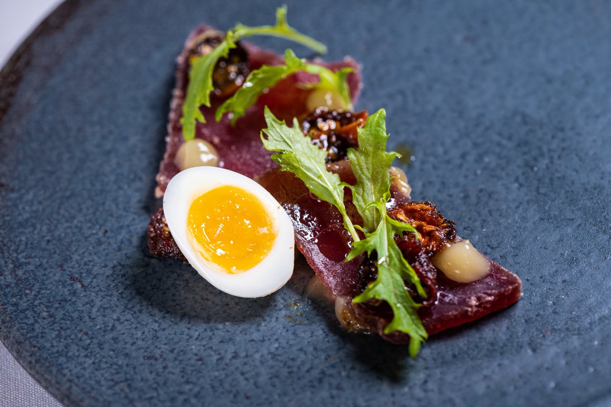 When you dine with us at Xiquet, your experience begins with an assortment of Valencia-inspired snacks, including our signature Mojama. This vibrant tuna loin enjoys a 36-hour salt cure before it is expertly dry-aged by our chefs for 4 weeks ⏳. 

exploretock.com/xiquet