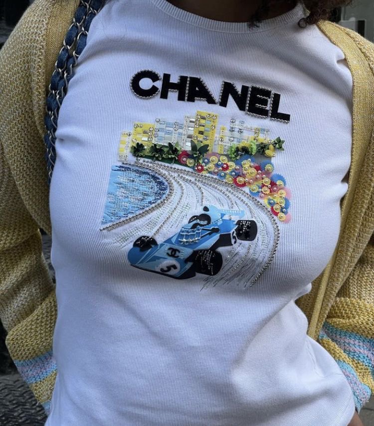 Everything we know about Madeleine White's viral Chanel F1 shirt