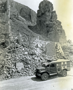 An ambulance moves past the rubble of a destroyed German fortress at Terracina, Italy, on May 26, 1944. U.S. Army Signal Corps photograph.

#WeRememberThem