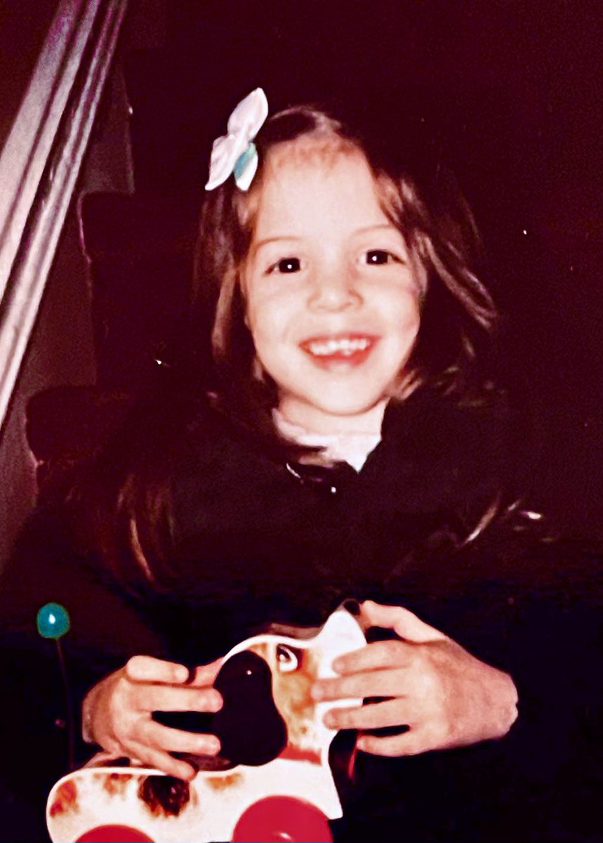 Mona Daniella (18 months) in her grandparents’ home, sitting in the stairwell, playing with the toy her dad played as a kid #Grief #BereavedParents #ChildLoss #SiblingLoss