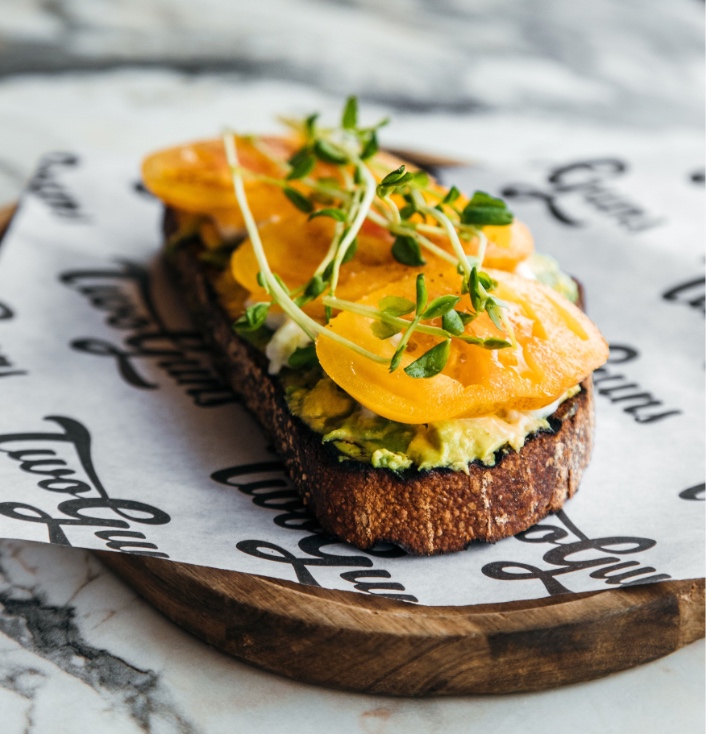 Come for the newbies, stay for the classics. Our local favorite, the Smashed Avocado Toast, features fresh tomato and pea shoots on a bed of smashed avocado spread, all piled onto a piece of our rustic sourdough. 

Try any of our six toasts, including three brand-new variation...