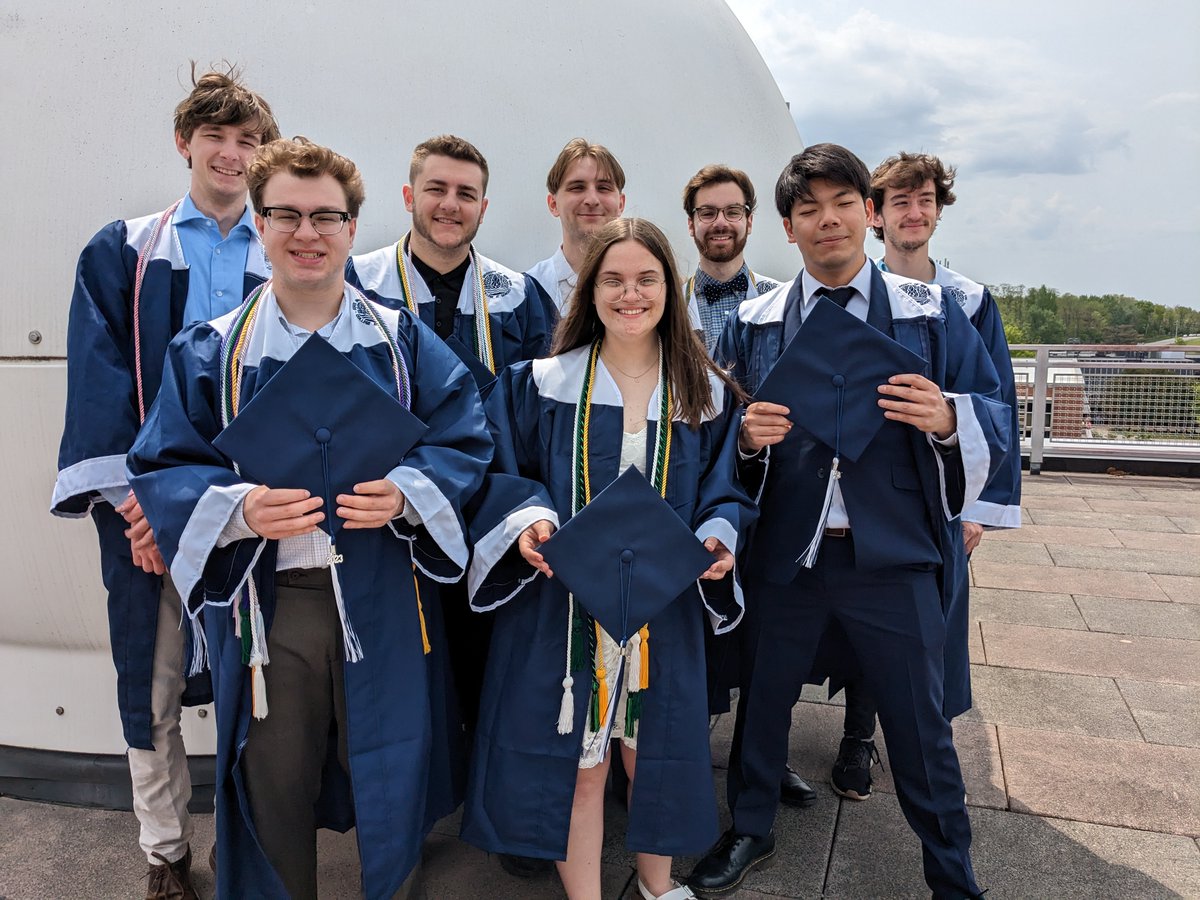 GeneseoPhysics's tweet photo. Congratulations to our physics graduates, class of 2023!  We are so proud of you all! Here is a photo of some of them sporting their caps and gowns up on the observatory on top of ISC. https://t.co/KdfHsQnCkf