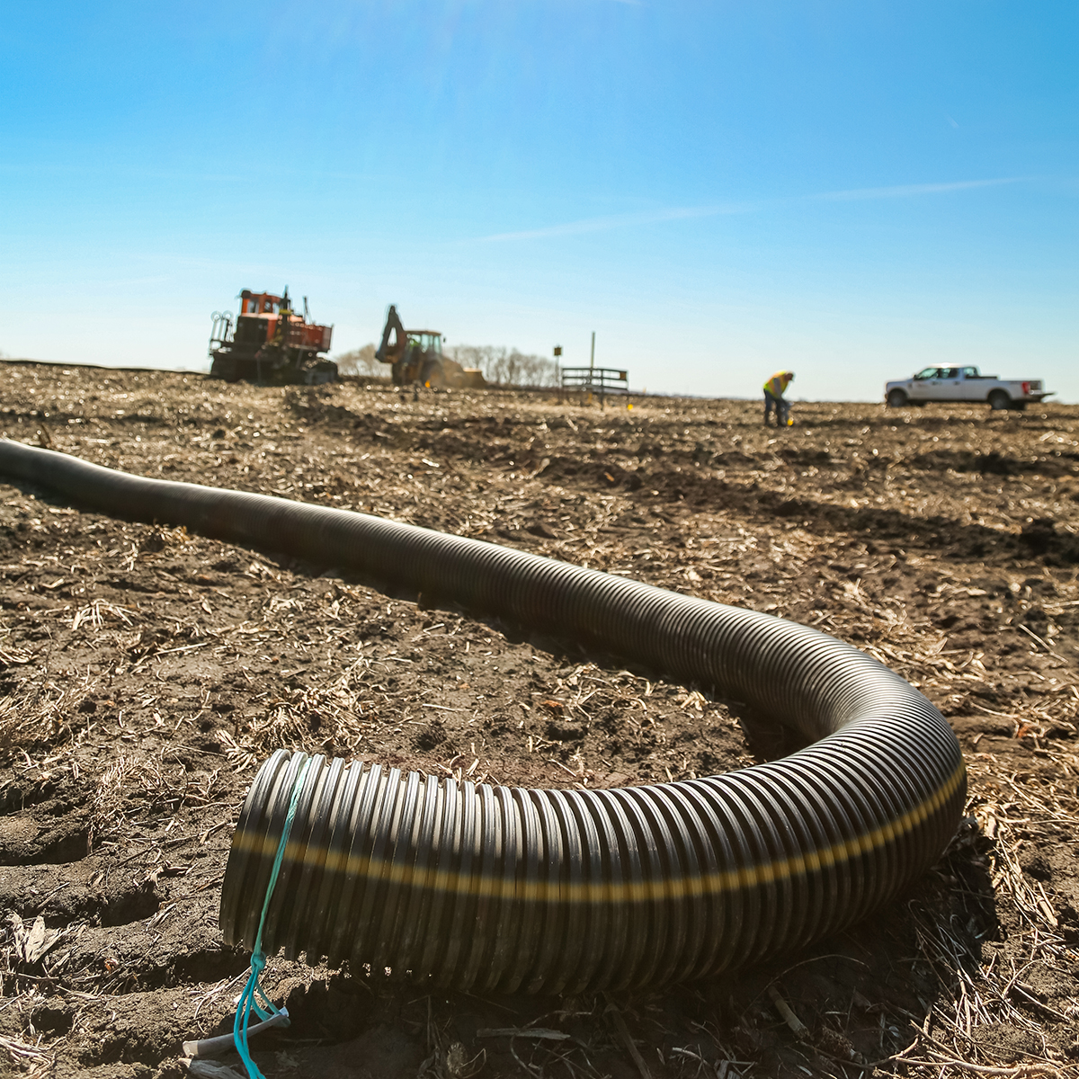 PrinscoInc's tweet photo. Signs of spring in Minnesota include sunshine, blue skies and hard-working drainage contractors installing flexible dual-wall pipe as part of a subsurface drainage system. #SpringTiling2023 #ItsALifestyle https://t.co/h9Lzspfc1W