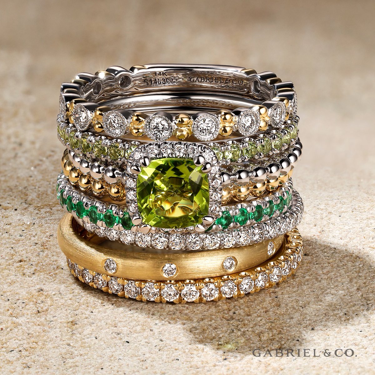 Mix, match, and stack your way to a unique and dazzling look with our stunning collection of stackable rings. From diamonds to emeralds and peridots, we've got something for everyone. 💖 bit.ly/3MDIOif. #GabrielandCo #fashionrings #stackablerings #stackablebands