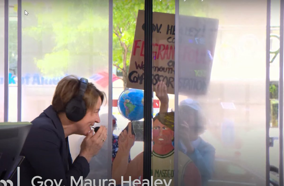 Katie Lannan (@katielannan) on Twitter photo as Gov. Healey is live on <a href="/BosPublicRadio/">Boston Public Radio</a> at the library today, she's greeted by a basketball-uniformed cutout of herself + sign urging her to call a "flagrant foul on Weymouth compressor station" #mapoli as Gov. Healey is live on <a href="/BosPublicRadio/">Boston Public Radio</a> at the library today, she's greeted by a basketball-uniformed cutout of herself + sign urging her to call a "flagrant foul on Weymouth compressor station" #mapoli