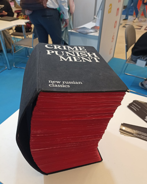 Students from the Ukrainian Leadership Academy have brought Crime without Punishment, a 50-kilogram book about the crimes of the Russian Federation, to International Book Fair in Warsaw.
It has 6,000 pages that symbolise the 6,000 children who have been abducted by the Russians.