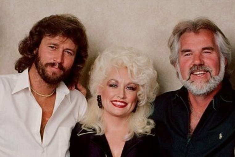 This month in '83, Kenny teamed w/ Sir @GibbBarry to record the renowned EYES THAT SEE IN THE DARK album, featuring songs written by + music/background vocals performed by the legendary @BeeGees ... among them:  the smash hit 'Islands In The Stream' w/ @DollyParton #FBF -Team KR