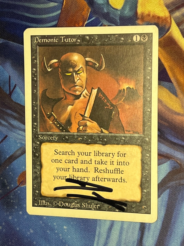 Gathering4Magic's tweet photo. Demonic Tutor signed by @douglasshuler_Illustrations
What a lovely card. It was given to @VaRedemtion as part of my first giveaway. What should I giveaway next? A box of cards? I Commander precon? One of these spiffy singed cards I keep posting?
#darkart #horror #OGMTG #MTG https://t.co/ffCwx3DUFA