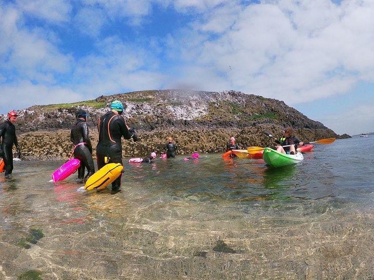 We enjoyed the most wonderful swim out to @theurigeller 's Lamb Island today, raising money for @nbbeachwheels. Glorious swim with my #SaltySelkie family and a brilliant team of supporters. #northberwick #seaswimming #thelamb #lambisland