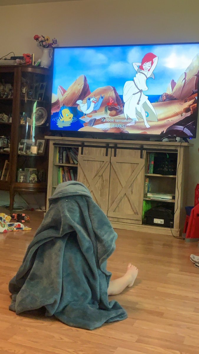 Oh to be small, cozy in a blanket, watching cartoons. ❤️🥺