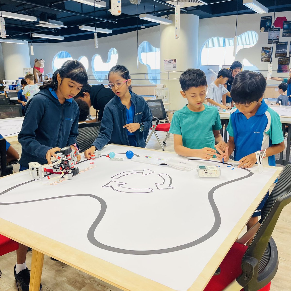 Unleashing Creativity and Collaboration: UWCSEA Dover and East Students join forces with Stamford American School for Robotics Relay Challenge!