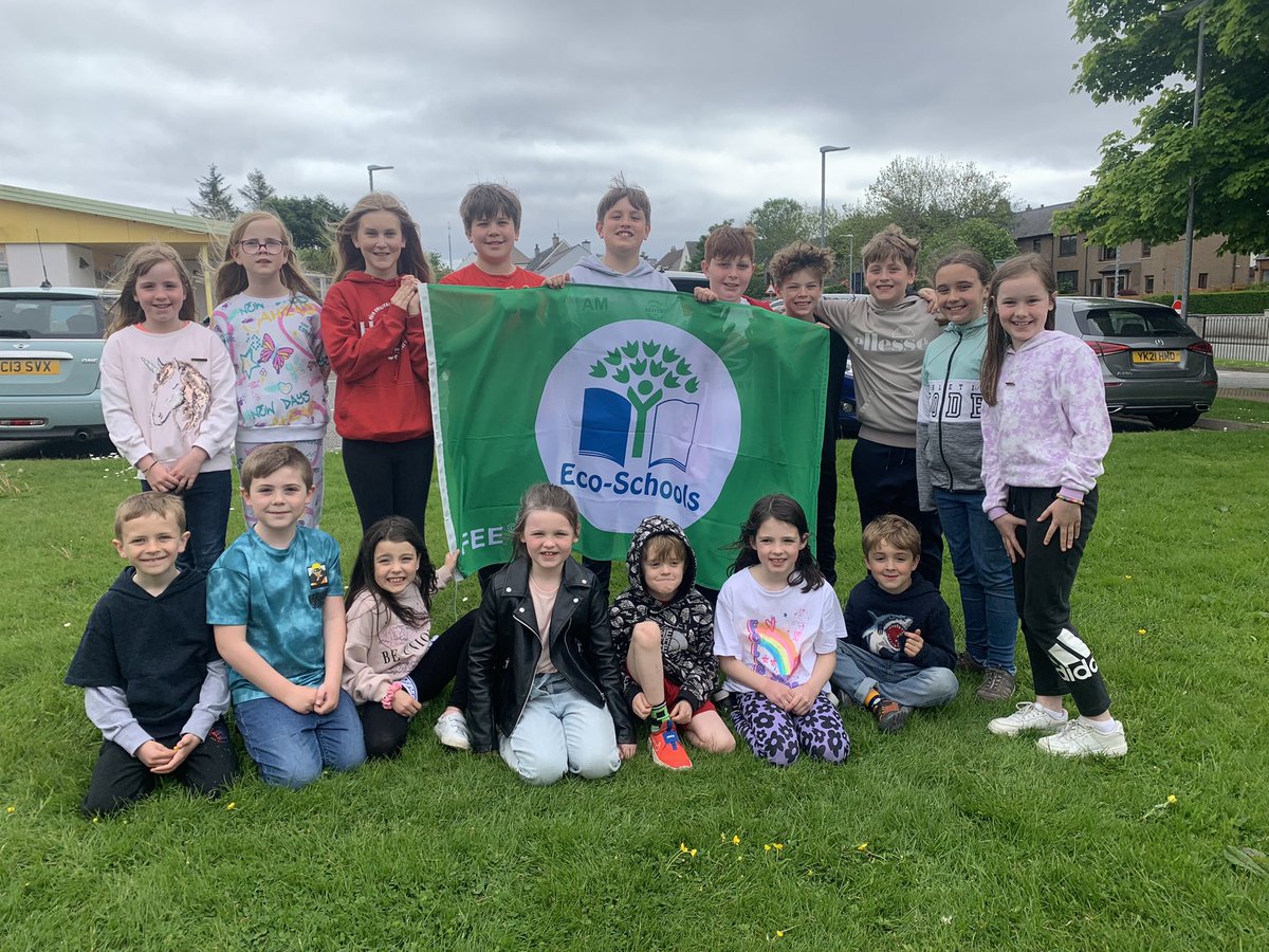 SYPrimary's tweet photo. Ar Slighe gu Bratach Uaine, 
Our Journey to the Eco Schools Green Flag!  We are delighted that we received the Eco Schools Green Flag this week from Keep Scotland Beautiful! Here is our Eco Committee with our flag! #ecoschool #greenflag #keepscotlandbeautiful #CNESlearning https://t.co/kbUVq9DP7N
