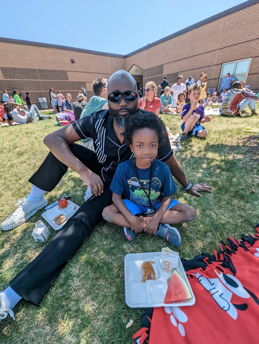 With my lil man. @ his  school BBQ today!