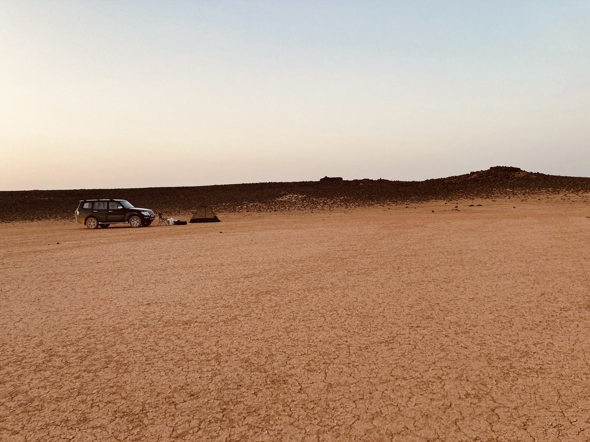 UKDA2Jordan's tweet photo. 18-hour overnight adventure to the east of #Jordan. 

Site 2:

Massive mud flat on edge of the basalt desert, Neolithic dwellings, smoothed rocks, inscriptions, ancient pathways through the rocks.

@UKANA2Jordan #BeautifulJordan  @VisitJordan https://t.co/UdATIxE8xh