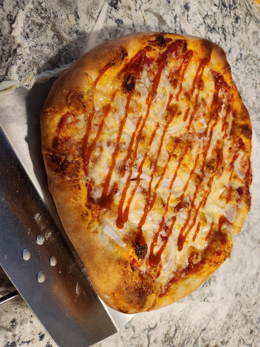 Maybe too simple for some, but delicious nonetheless. Onion and Sriracha pizza