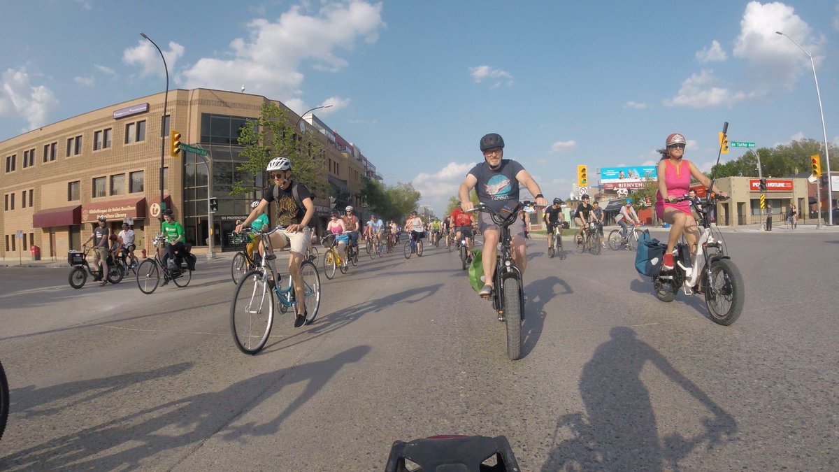 ianwalkerwpg's tweet photo. 🚴♀️🌍 Riding with my kids is more than just fun and exercise—it's a statement of #ClimateAction! As we mass on the streets, we're shaping a greener future for them. Together, we're pedaling towards #sustainability! #CyclingForClimate #CriticalMass #KidsWhoCare photo credit @ianmcc https://t.co/056w3Rs0Mo